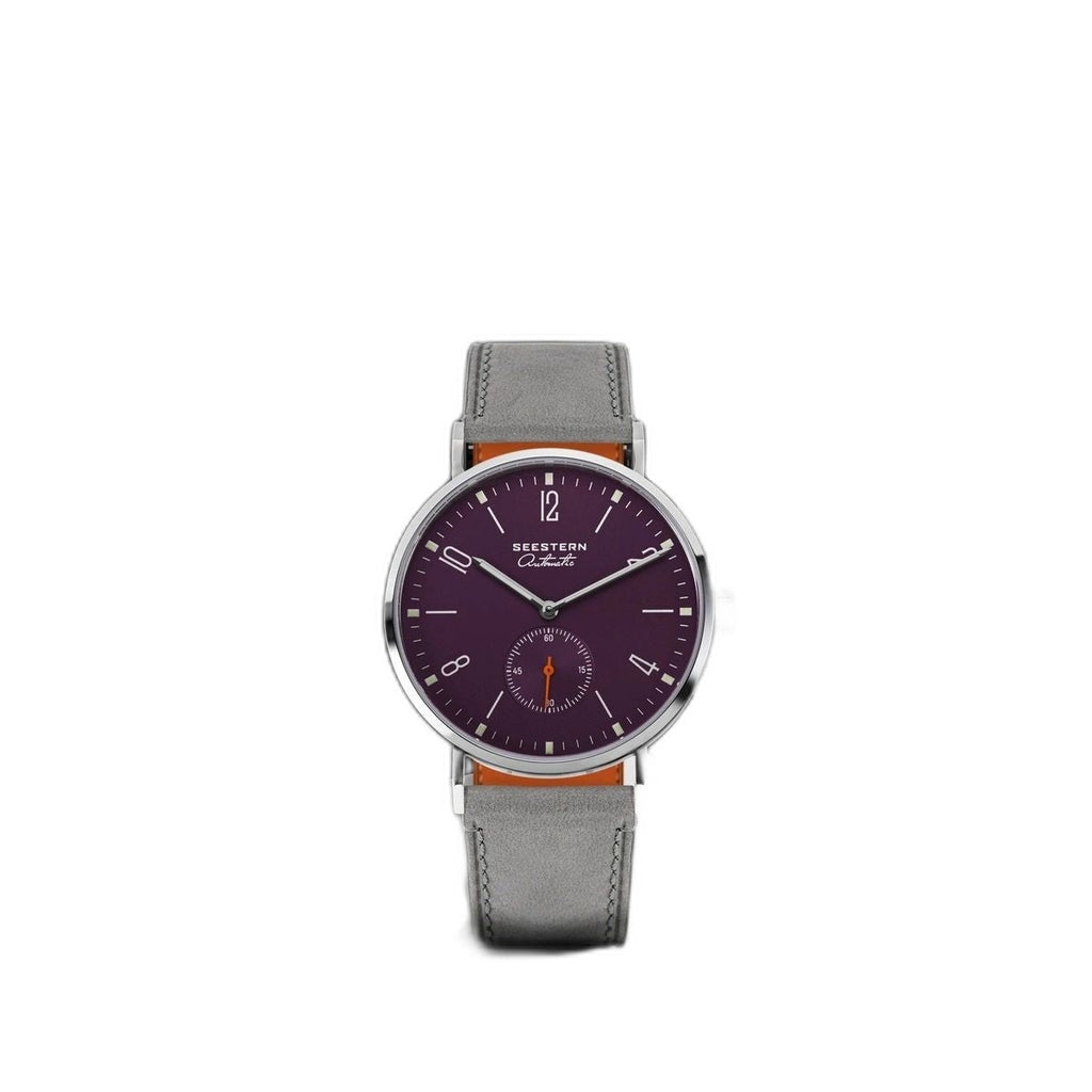 Seestern S382 purple dial watch centred on white, grey suede strap, plain product shot