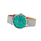 Seestern S382 turquoise dial dress watch on grey suede strap, angled studio product view