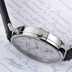 Seestern S382 silver-white dial dress watch side profile with star crown and slim steel case