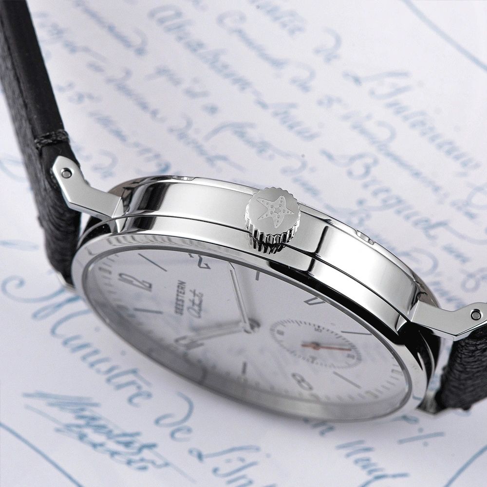 Seestern S382 silver-white dial dress watch side profile with star crown and slim steel case