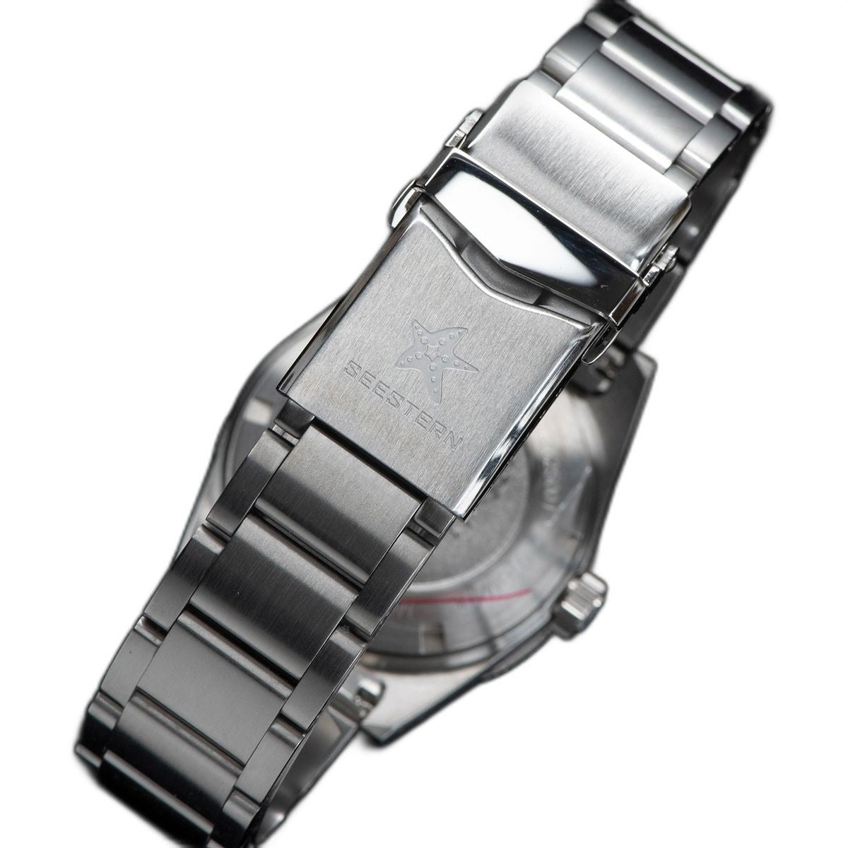 Seestern S404 folded steel bracelet clasp with engraved Seestern star, close-up detail