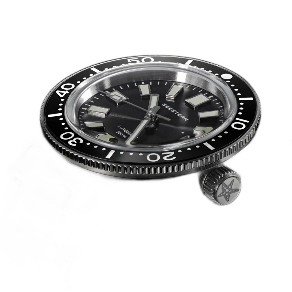 Seestern S404 watch head laid flat beside its detached screw-down crown, showing bezel knurling