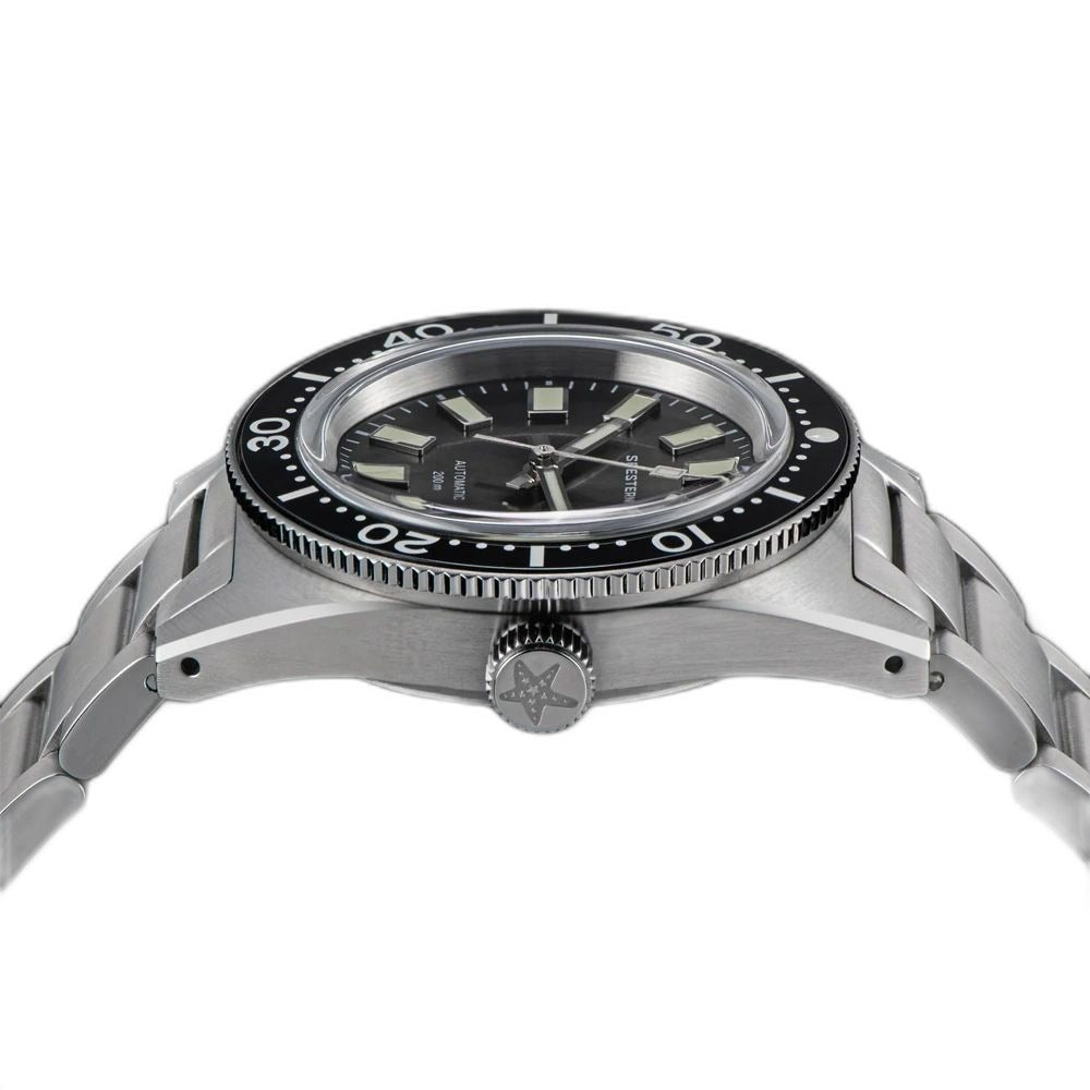 Seestern S404 diver side profile showing black dive bezel and star-engraved crown, steel bracelet
