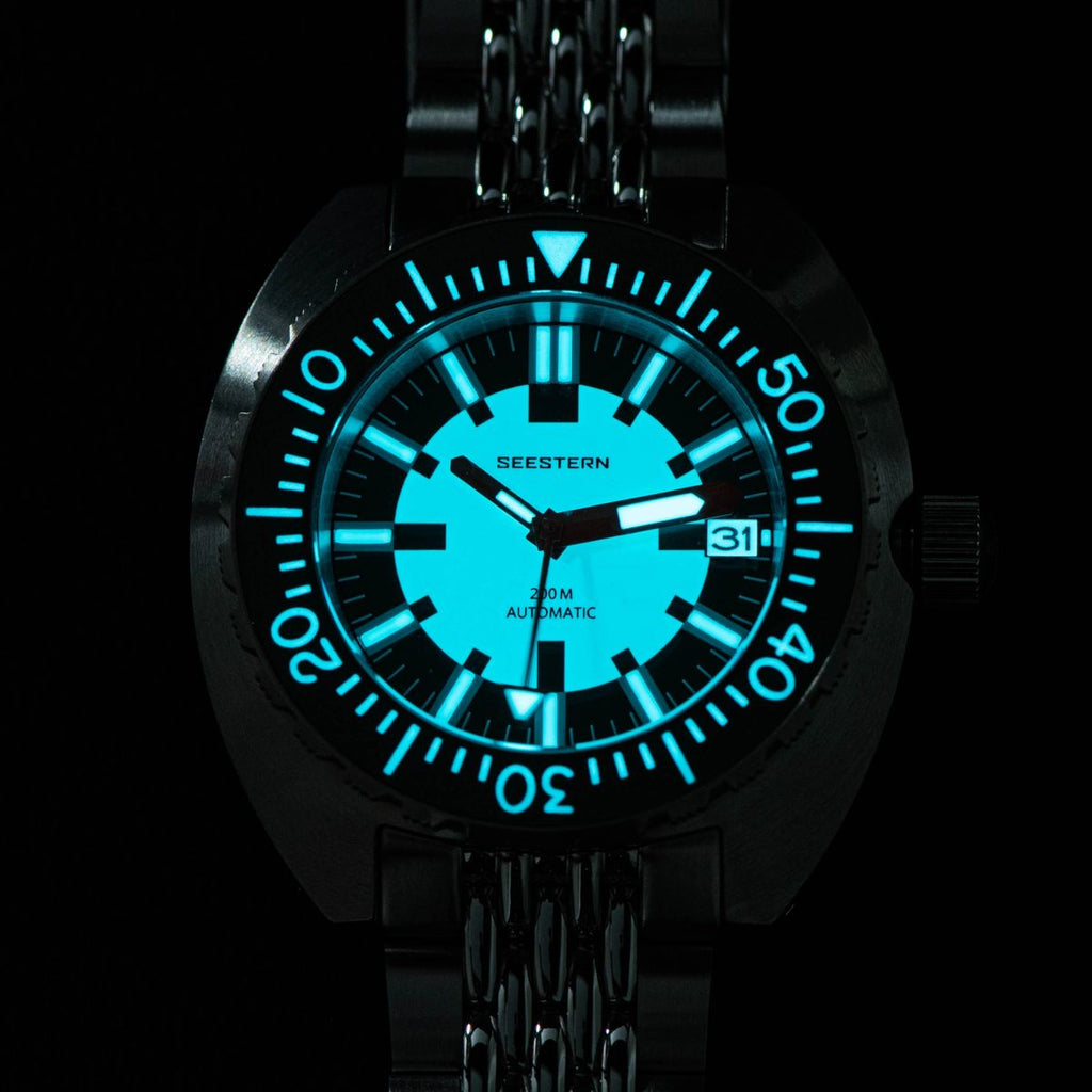 Seestern S406-2 Full Lume diver dial glowing bright blue lume in the dark, steel bracelet