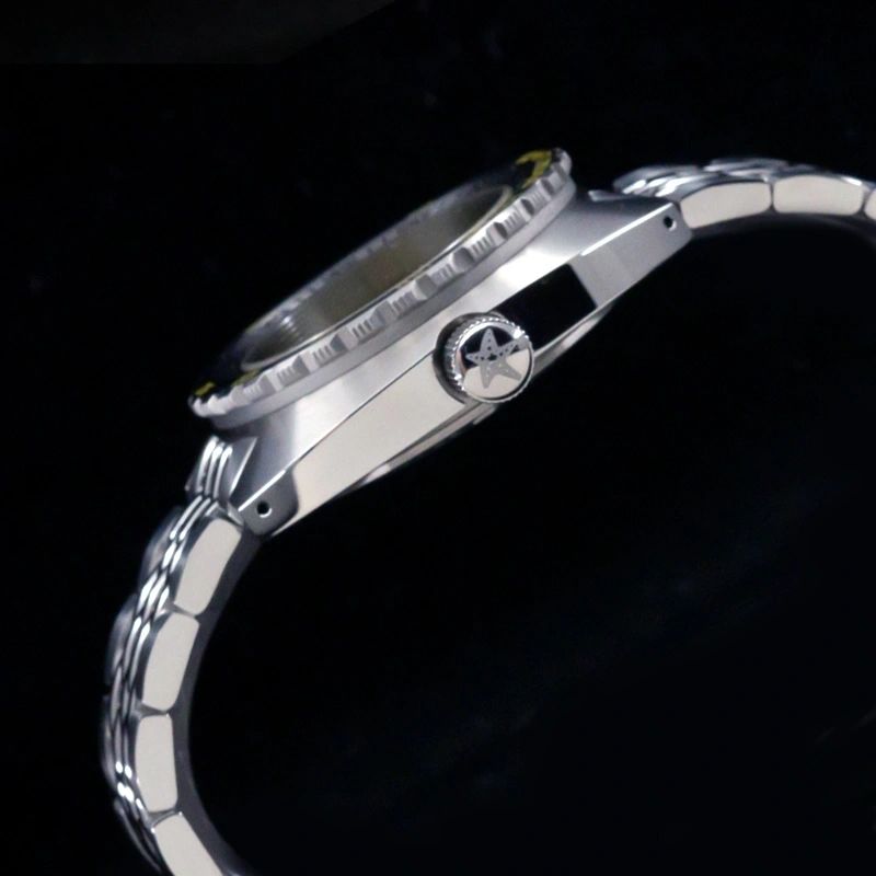 Seestern S406 case side profile with the signed crown, shot against a dark background