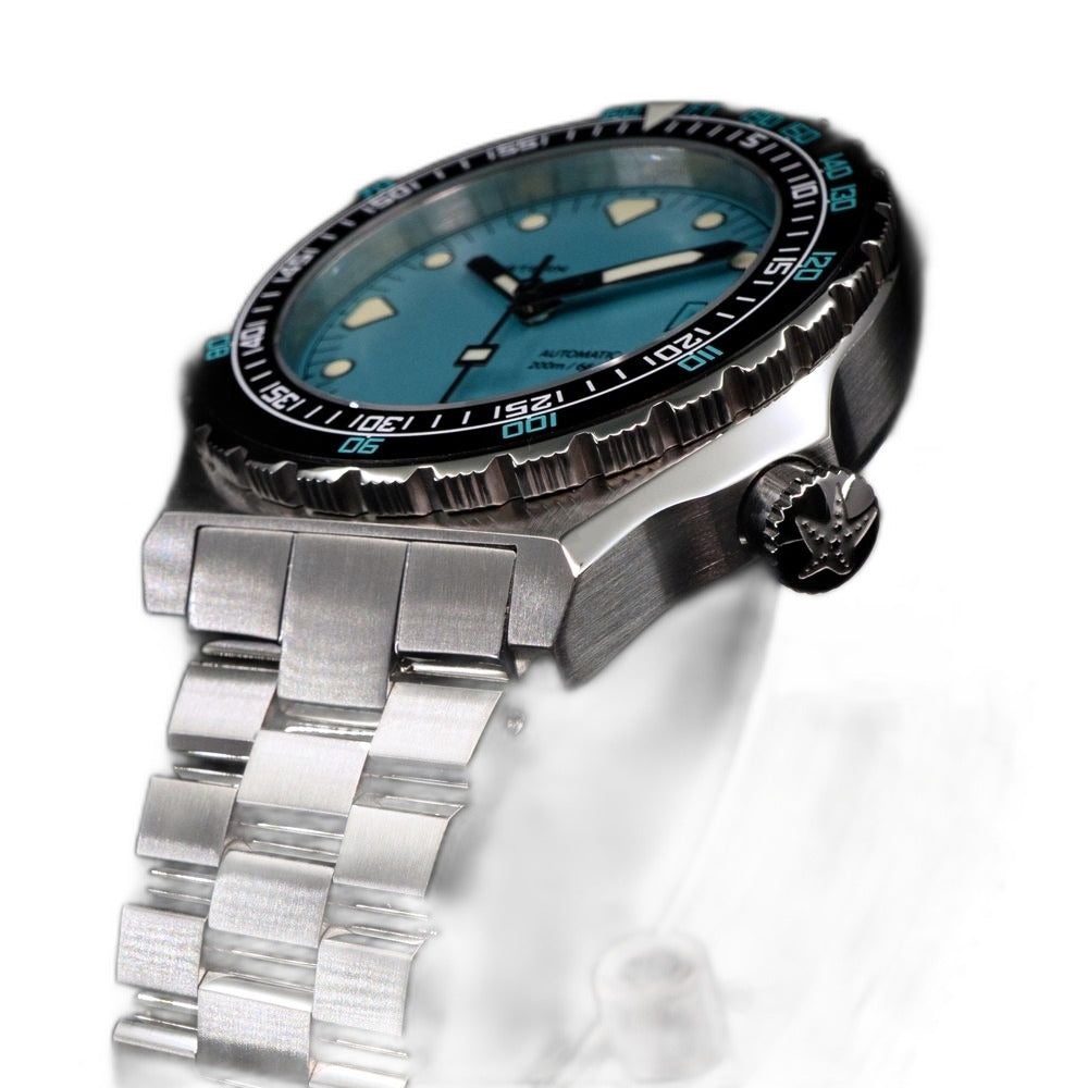 Seestern S407 Tiffany blue dial diver angled to show signed star crown and black bezel