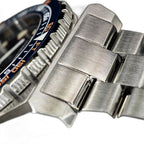 Seestern S407 steel bracelet clasp macro with dark blue ceramic bezel edge, close-up detail