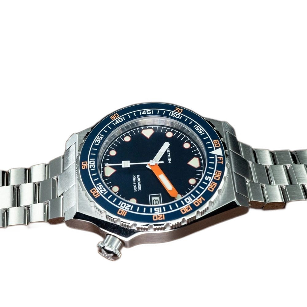 Seestern S407 dark blue ceramic diver on steel bracelet, angled view on brown leather