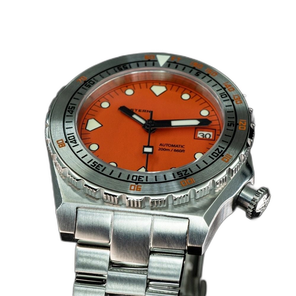 Seestern S407 orange ceramic diver on steel bracelet, bright angled studio view