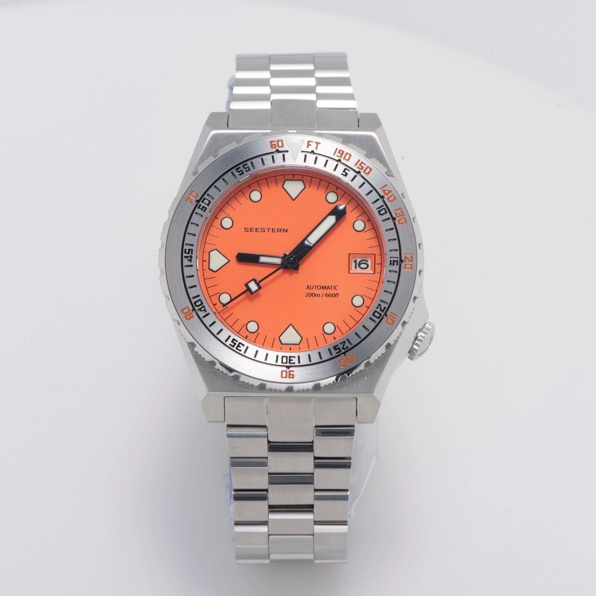 Seestern S407 automatic ceramic diver, orange dial and steel bracelet, front-on studio view