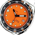 Seestern S407 orange dial close-up with sword hands, applied lume markers and date at 3