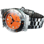 Seestern S407 orange-dial diver side profile with star-engraved crown and steel bracelet