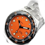 Seestern S407 orange dial tilted three-quarter view with black bezel and orange minute track