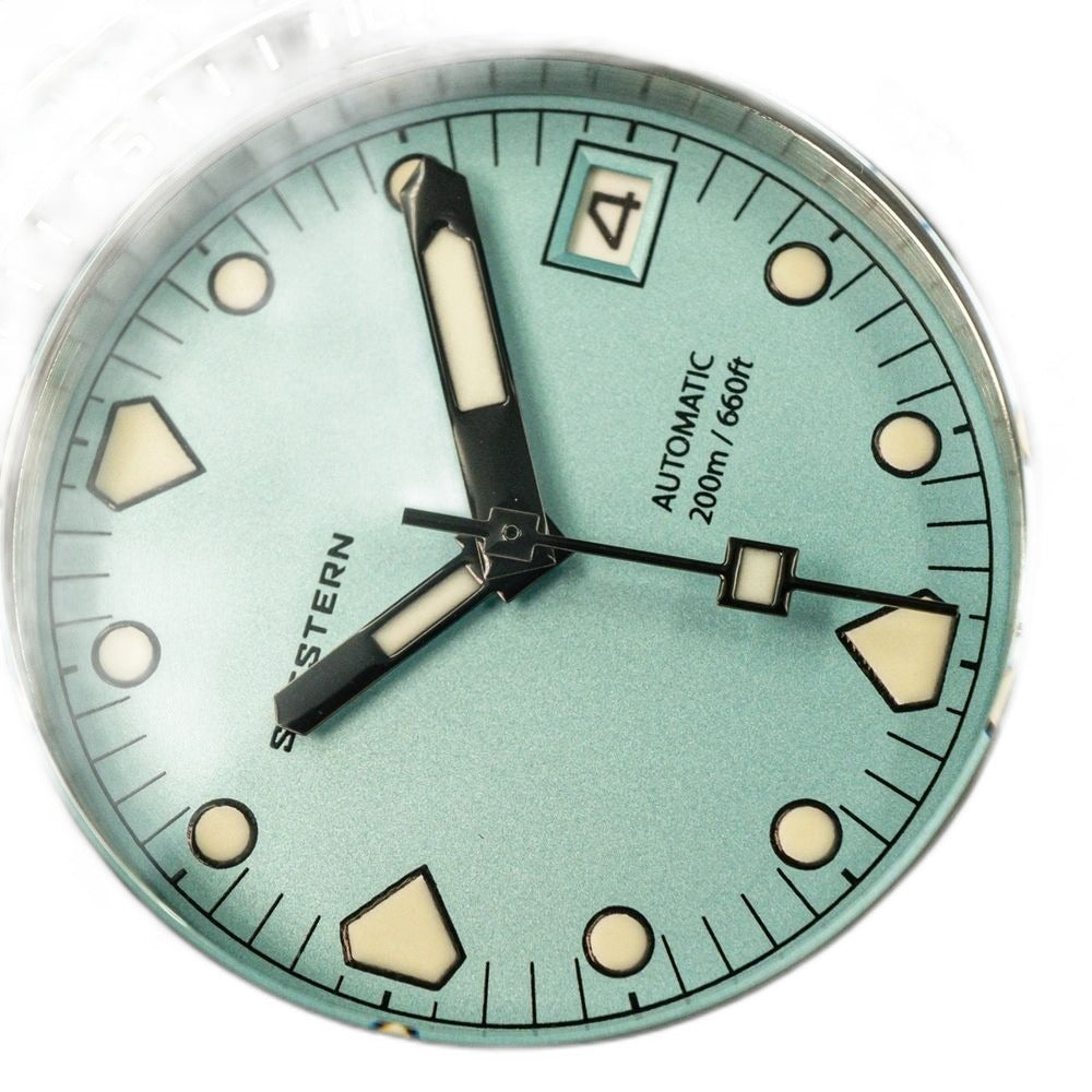 Seestern S407 tiffany blue dial macro showing SEESTERN print, sword hands and date