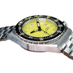 Seestern S407 yellow-dial diver side profile with star-engraved crown and steel bracelet