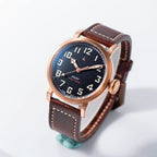 Seestern S408 automatic bronze pilot, black textured dial and brown leather strap, three-quarter view