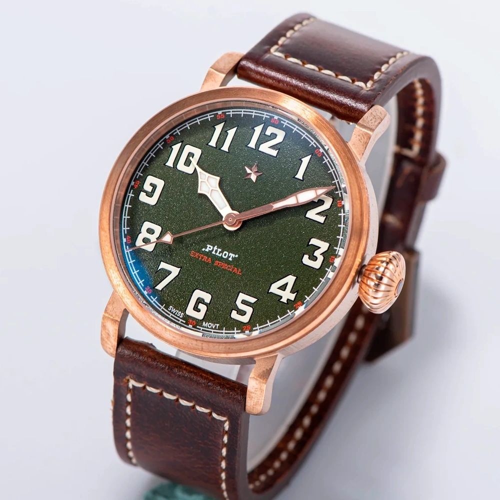 Seestern S408 bronze pilot, green textured dial and brown leather strap, dramatic angled studio view