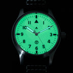 Seestern S424 flieger dial glowing bright green full lume in the dark, triangle and numerals illuminated