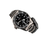 Seestern S430 black-dial titanium diver worn on wrist with titanium bracelet, close-up