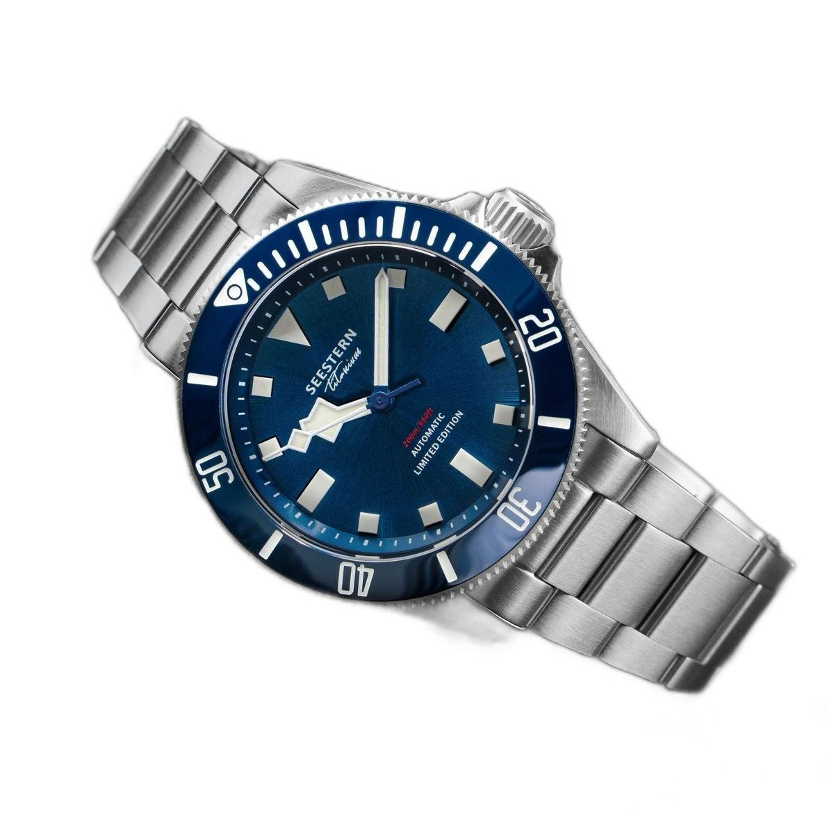 Seestern S430 titanium diver, blue sunburst dial and bezel on titanium bracelet, angled view on stone