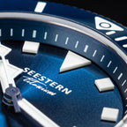 Seestern S430 blue dial extreme macro showing SEESTERN Titanium print, applied markers and triangle