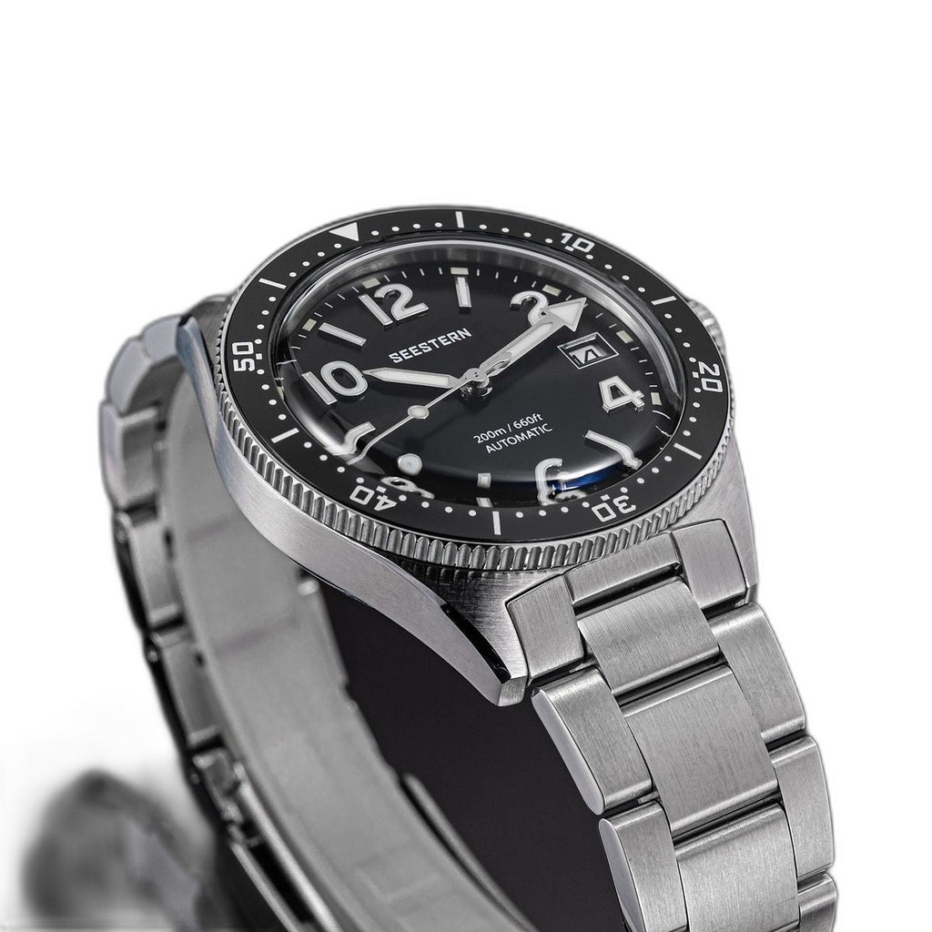 Seestern S434-2 black-dial skin diver on steel bracelet, close-up angled view