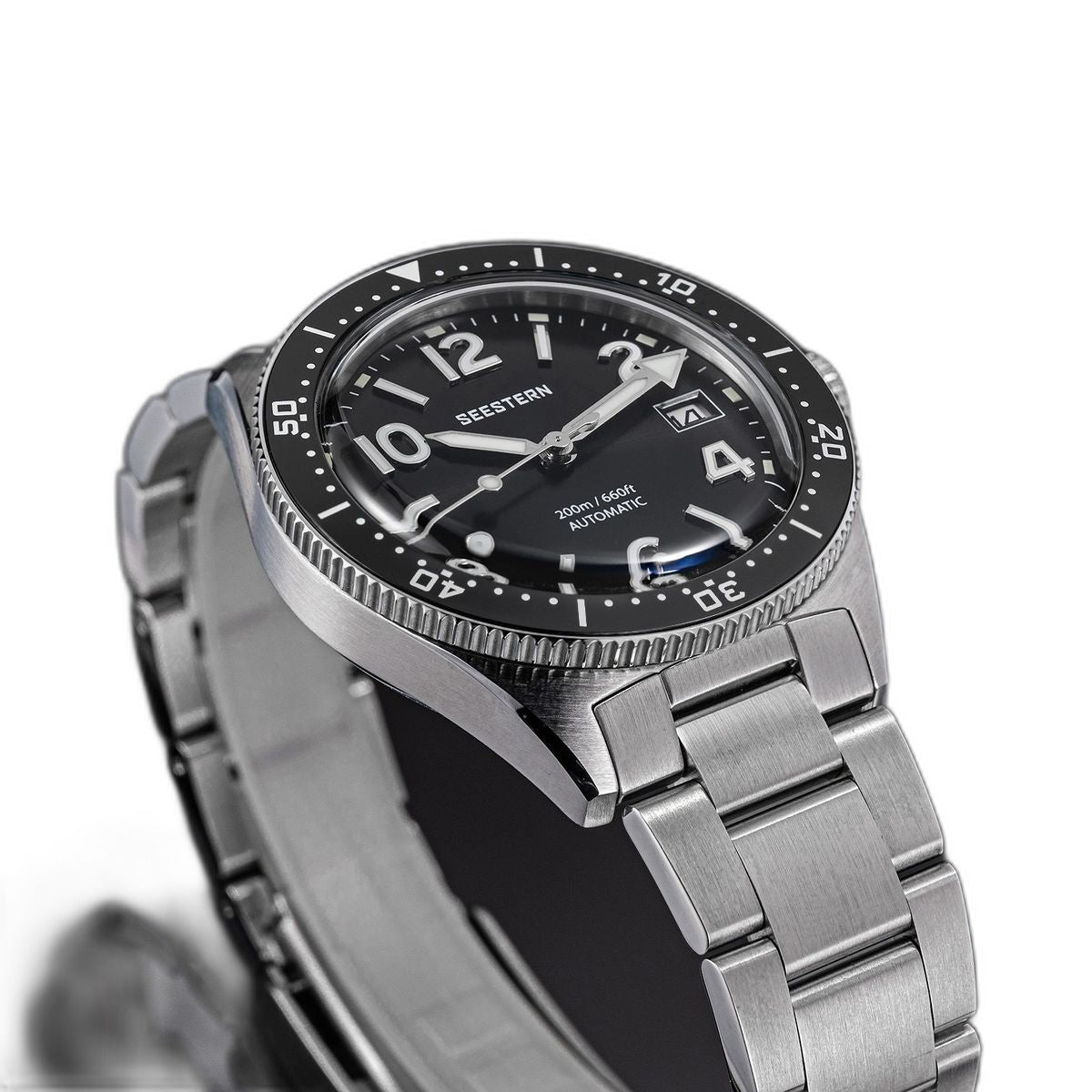 Seestern S434-2 black-dial skin diver on steel bracelet, close-up angled view
