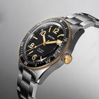 Seestern S434-2 black-and-gold skin diver on steel bracelet, angled studio view