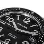 Seestern S434-2 black dial extreme macro showing SEESTERN print, arrow hand and applied markers
