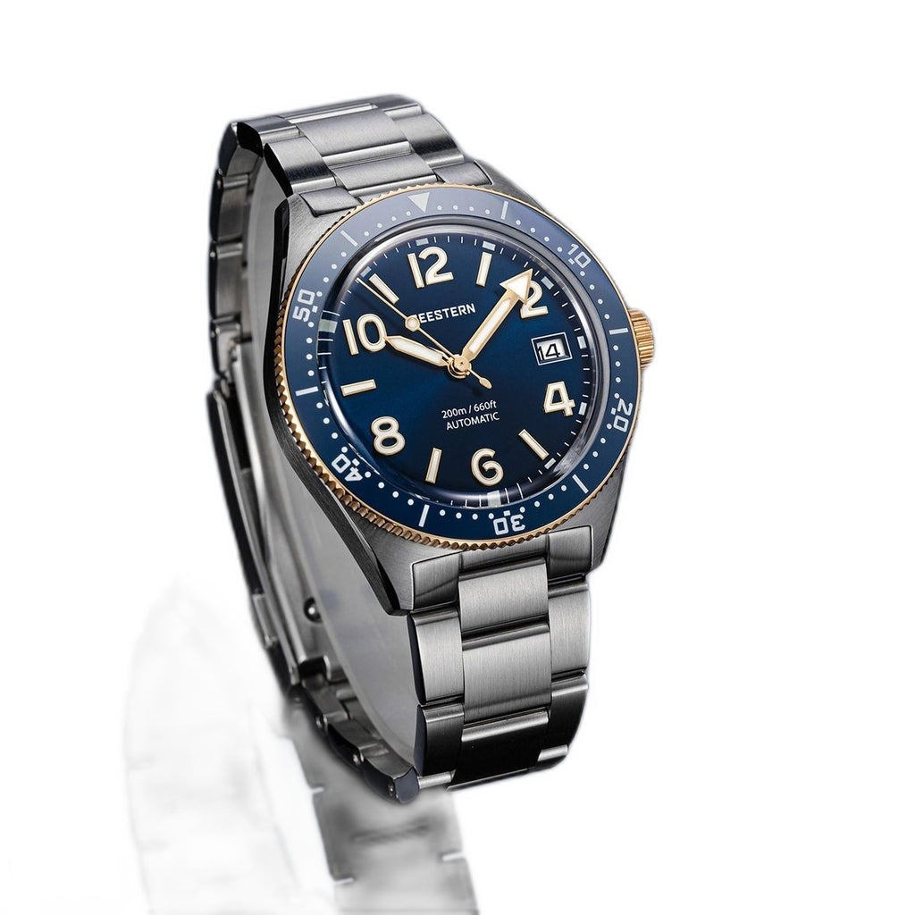 Seestern S434-2 blue-and-gold skin diver on steel bracelet, angled view on grey