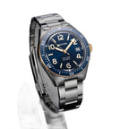 Seestern S434-2 blue-and-gold skin diver on steel bracelet, angled view on grey