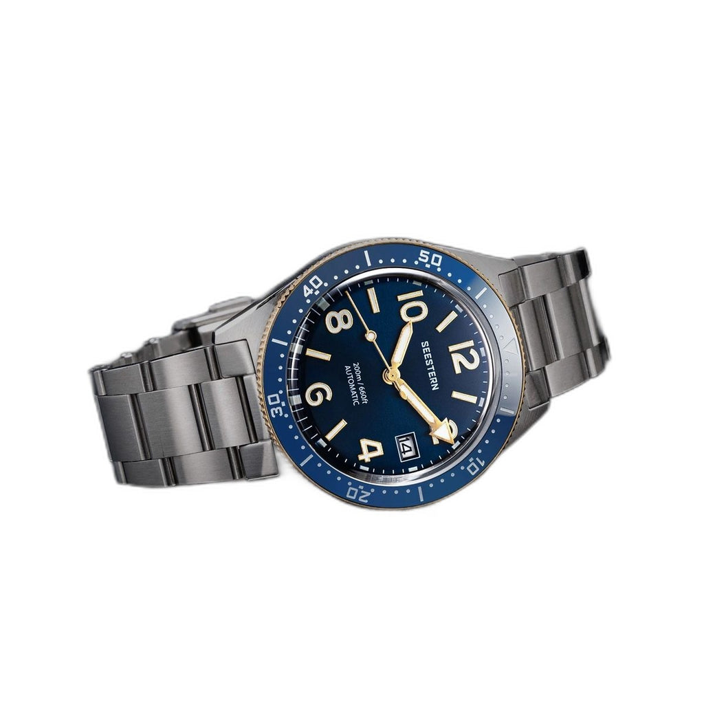Seestern S434-2 blue-and-gold skin diver, gold bezel and hands, steel bracelet, angled view