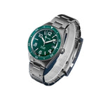 Seestern S434-2 green-dial skin diver on steel bracelet, angled studio view on blue