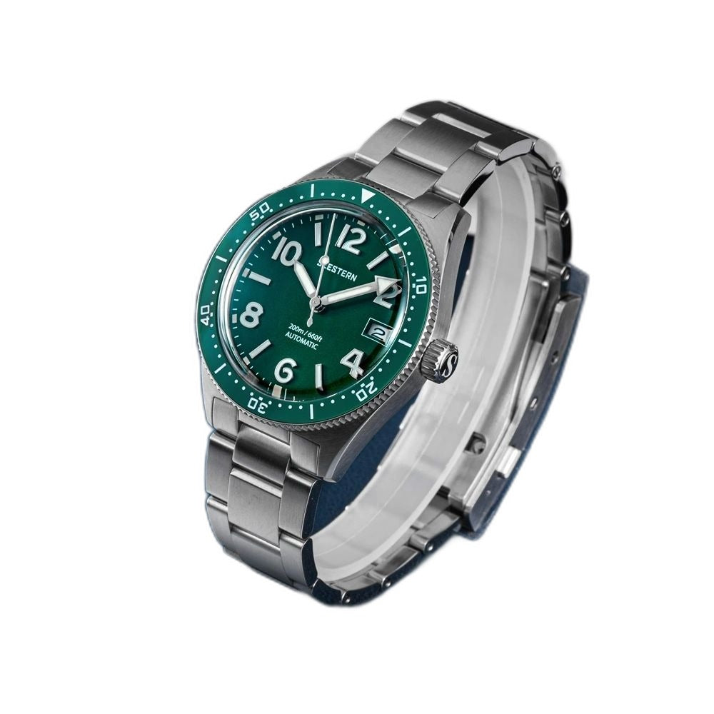 Seestern S434-2 green-dial skin diver on steel bracelet, angled studio view on blue