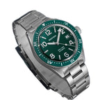 Seestern S434-2 green-dial skin diver on steel bracelet, dramatic angled view on blue