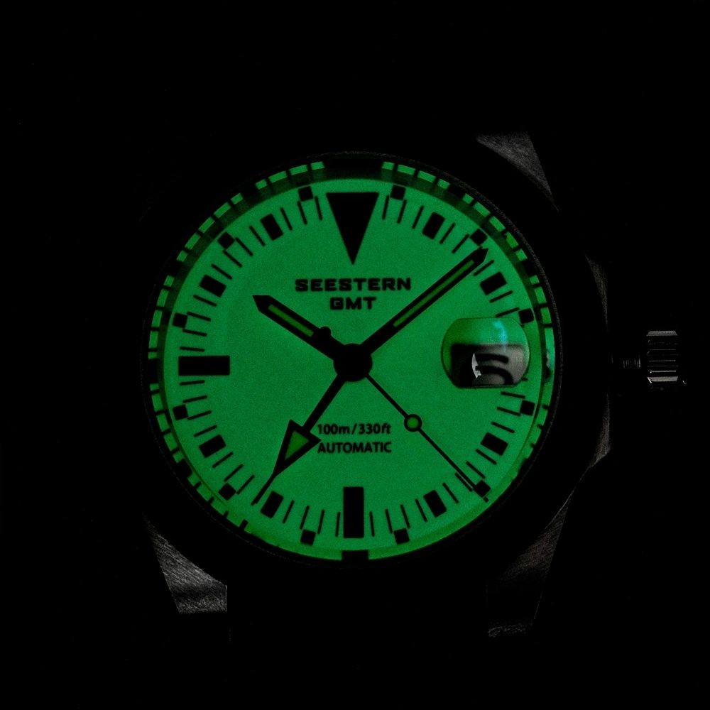Seestern S436-2 GMT dial glowing bright green full lume in the dark, markers and hands illuminated