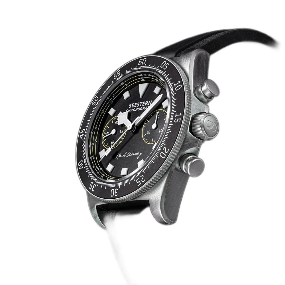 Seestern S443 chronograph, black dial with yellow accents, black strap, angled view with starfish crown