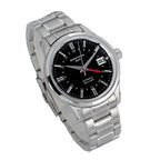 Seestern S446 black-dial GMT with red GMT hand on steel bracelet, three-quarter angled view