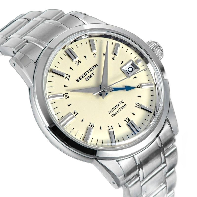 Seestern S446 cream-dial GMT on steel bracelet, three-quarter angled view