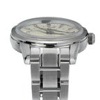 Seestern S446 low side profile of the cream GMT showing slim polished case and steel bracelet