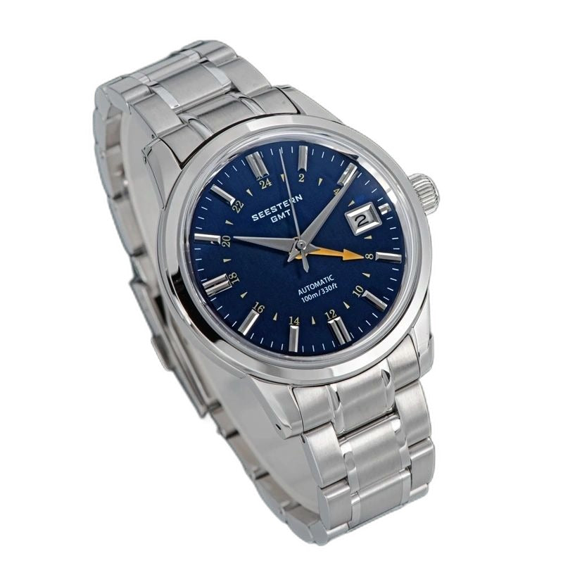 Seestern S446 navy blue-dial GMT on steel bracelet, dramatic angled studio view