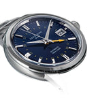 Seestern S446 navy blue-dial GMT with orange GMT hand on steel bracelet, angled view