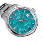 Seestern S446 teal green mint-dial GMT on steel bracelet, angled front studio view