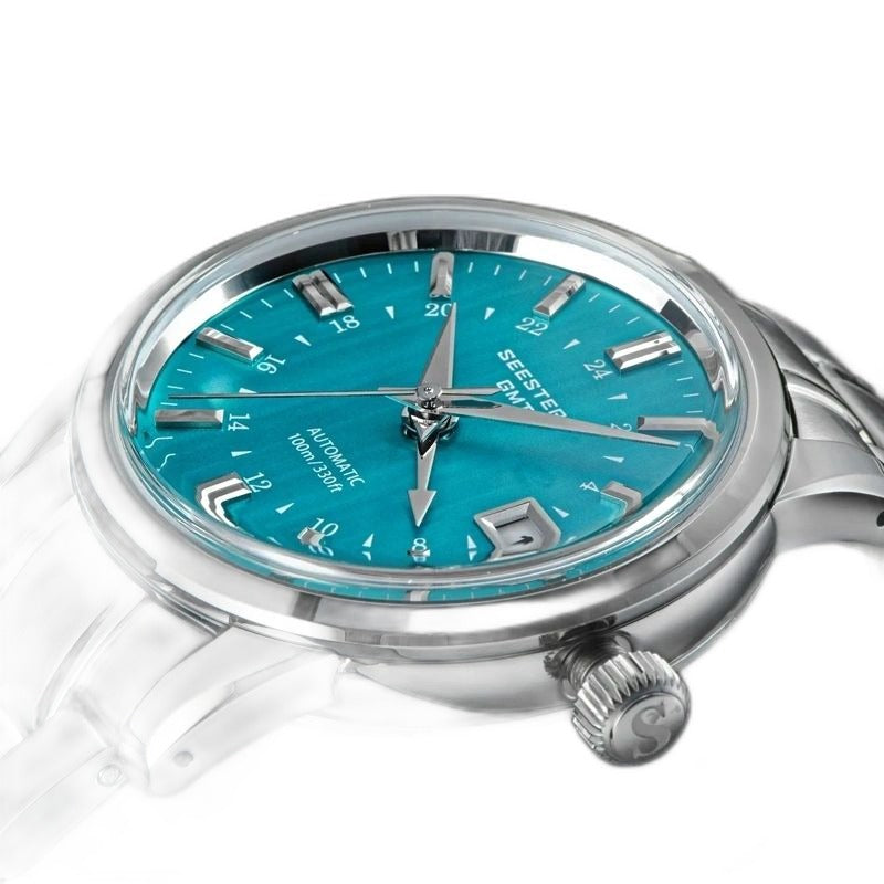Seestern S446 teal green mint-dial GMT on steel bracelet, angled studio product view