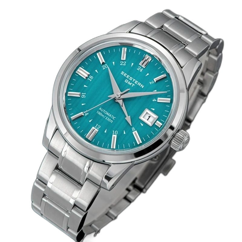 Seestern S446 teal green mint-dial GMT on steel bracelet, three-quarter angled view
