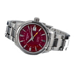 Seestern S446 red-dial GMT on steel bracelet, angled view on white background