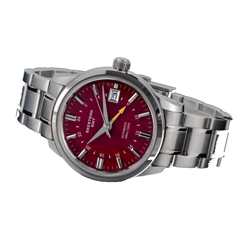 Seestern S446 red-dial GMT on steel bracelet, angled view on white background