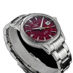 Seestern S446 red-dial GMT on steel bracelet, three-quarter angled view