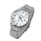 Seestern S446 silver-dial GMT on steel bracelet, angled flat-lay on blue notebook