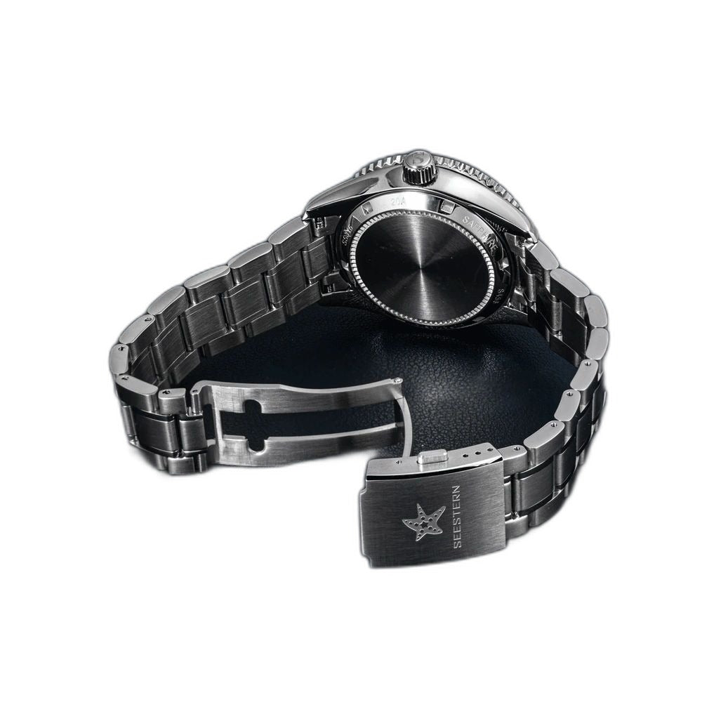 Seestern S456 solid caseback and folding clasp with Seestern starfish, rear view on navy